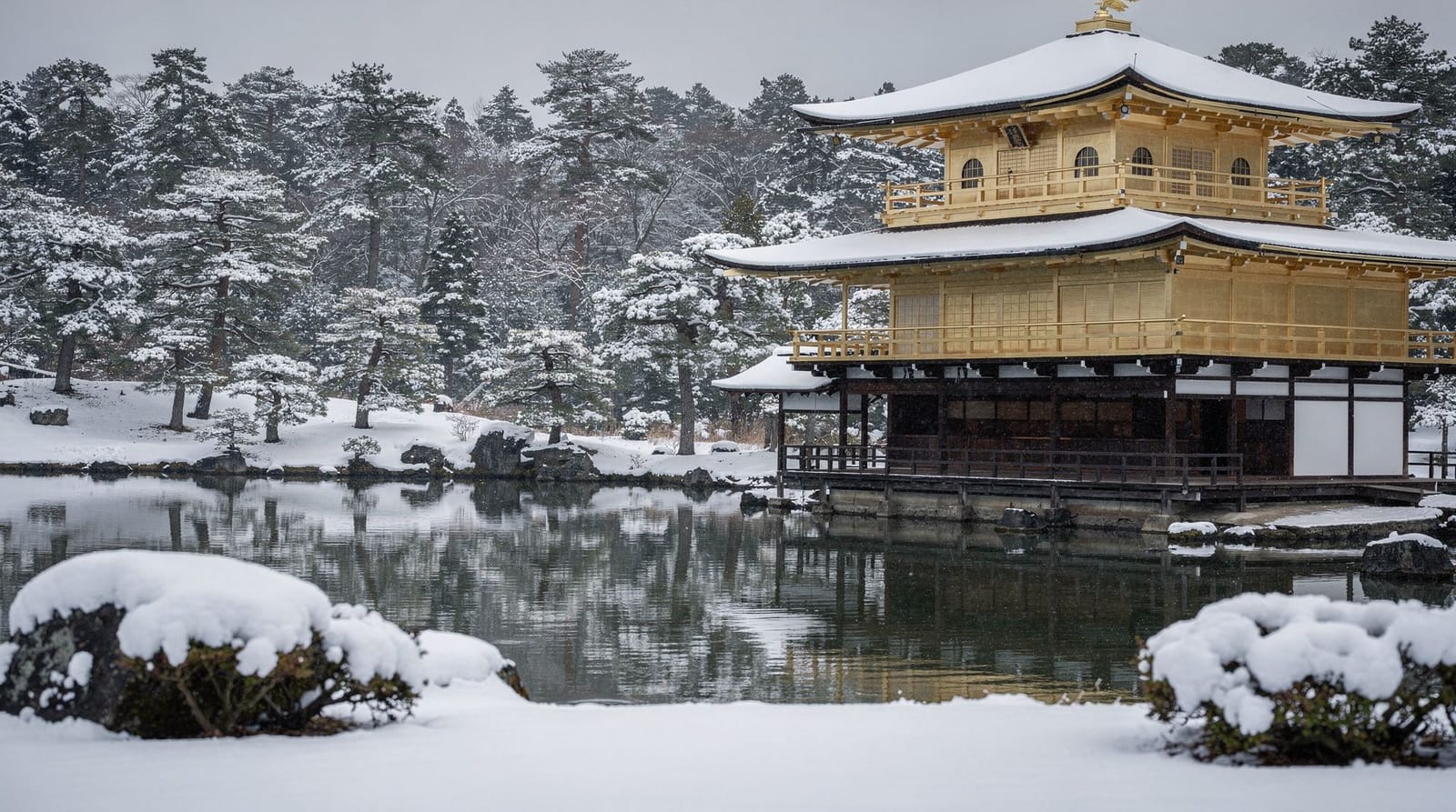 Kyoto in winter — snow, quiet temples, illuminations, and New Year — Kyoto winter guide, month by month — occasional snow on Kinkaku-ji, thin crowds,